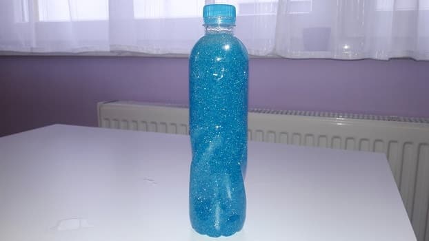 Homemade Sensory Bottle for Child Sensory development - Bottle in Action