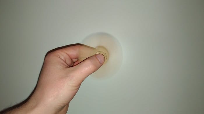The homemade cardboard fidget spinner spinning