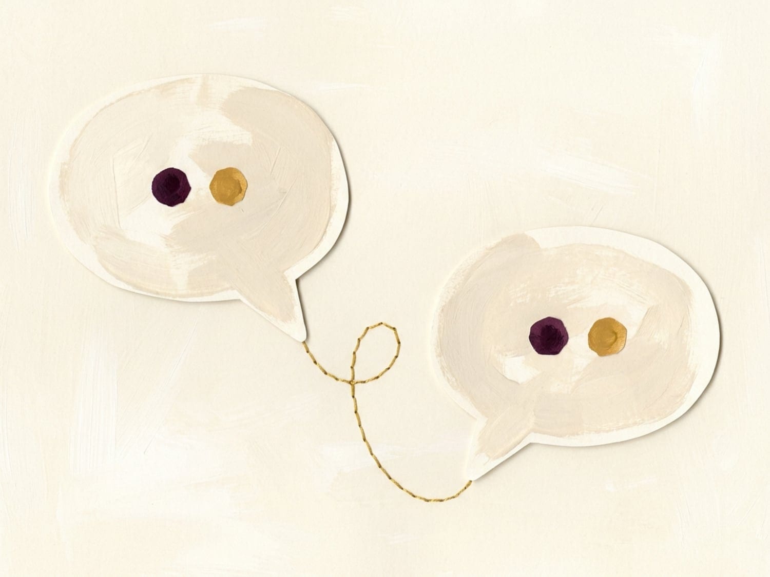 Papercut illustration of two speech bubbles on a gold thread holding little plum and gold dots - a five-month-old's first babbled syllables