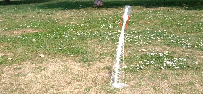 Homemade Rocket with Vinegar and Baking Soda in flight