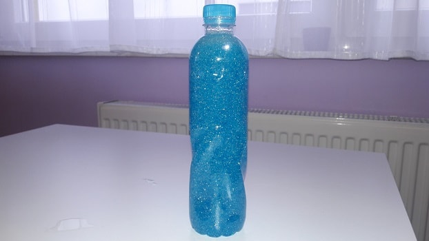 Homemade Sensory Bottle for Child Sensory development - Bottle in Action