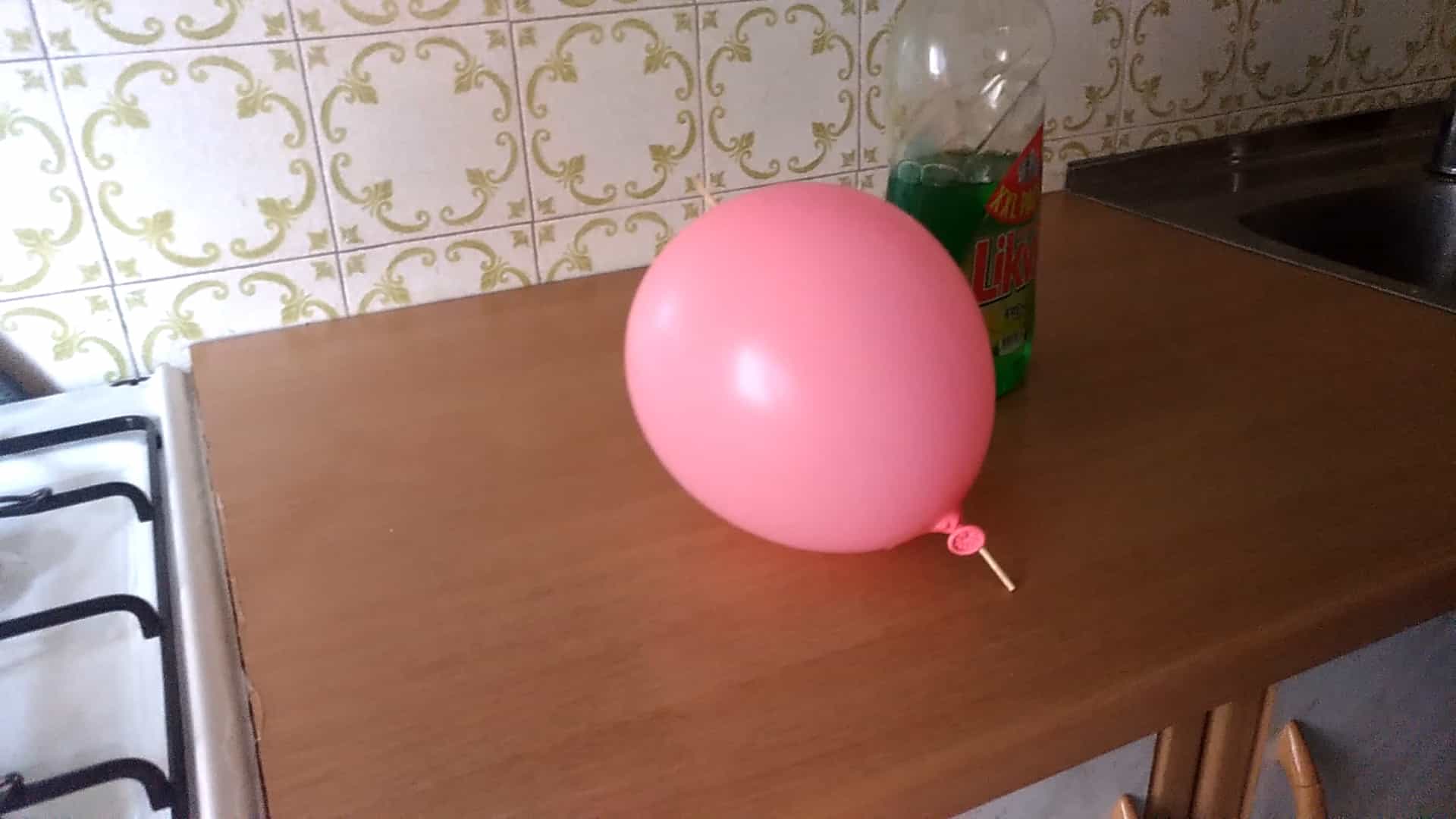 balloon stick experiment