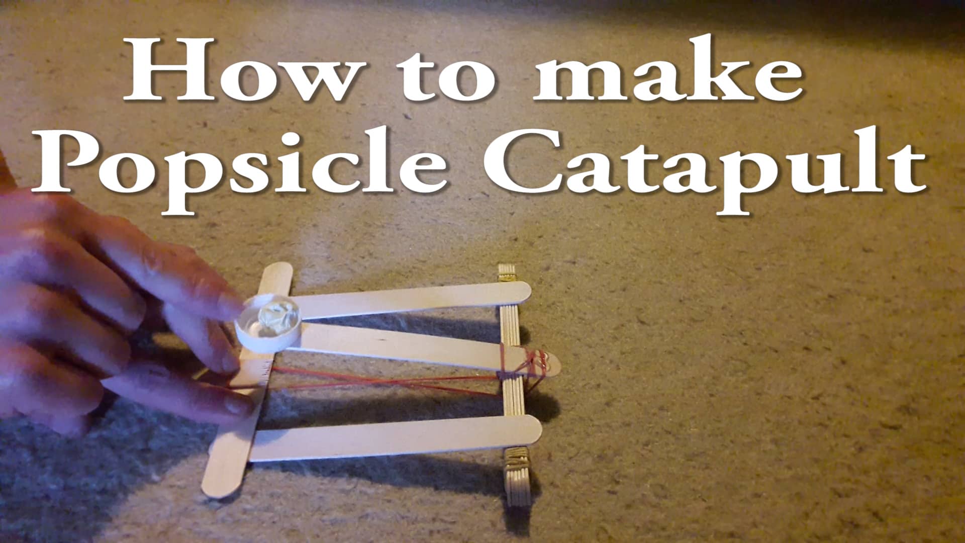 Make a lolly or popsicle stick catapult
